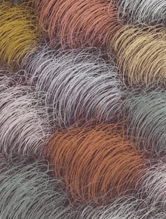 Rounded tufts of fine hatched strokes. afactum